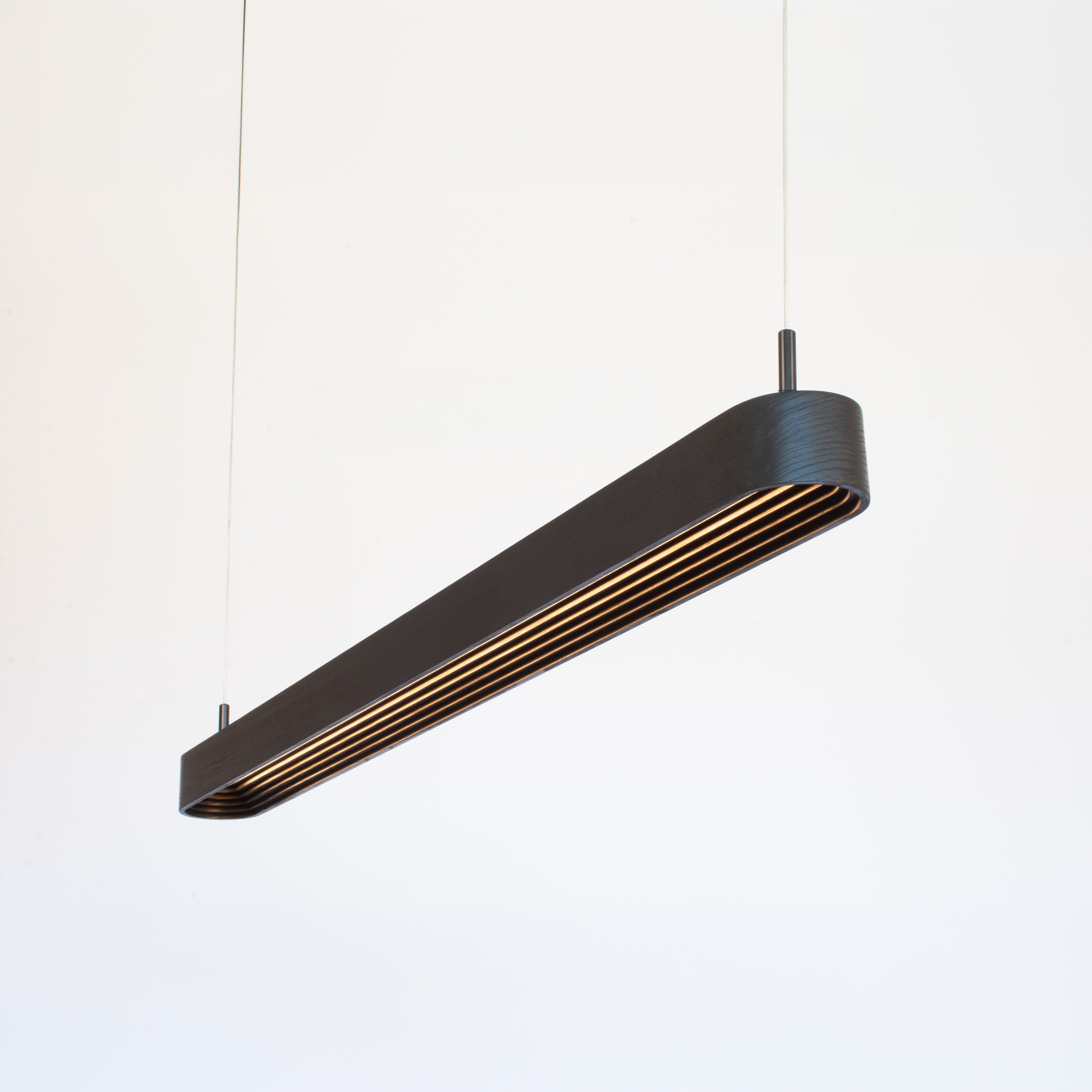 Bold Apollo Pendant wood linear suspension on white background